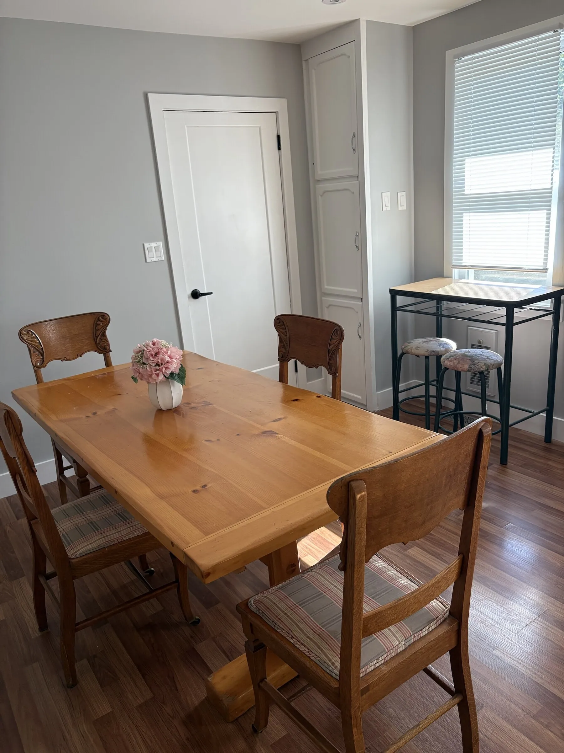 Pine farmhouse dining table and a bistro high-top